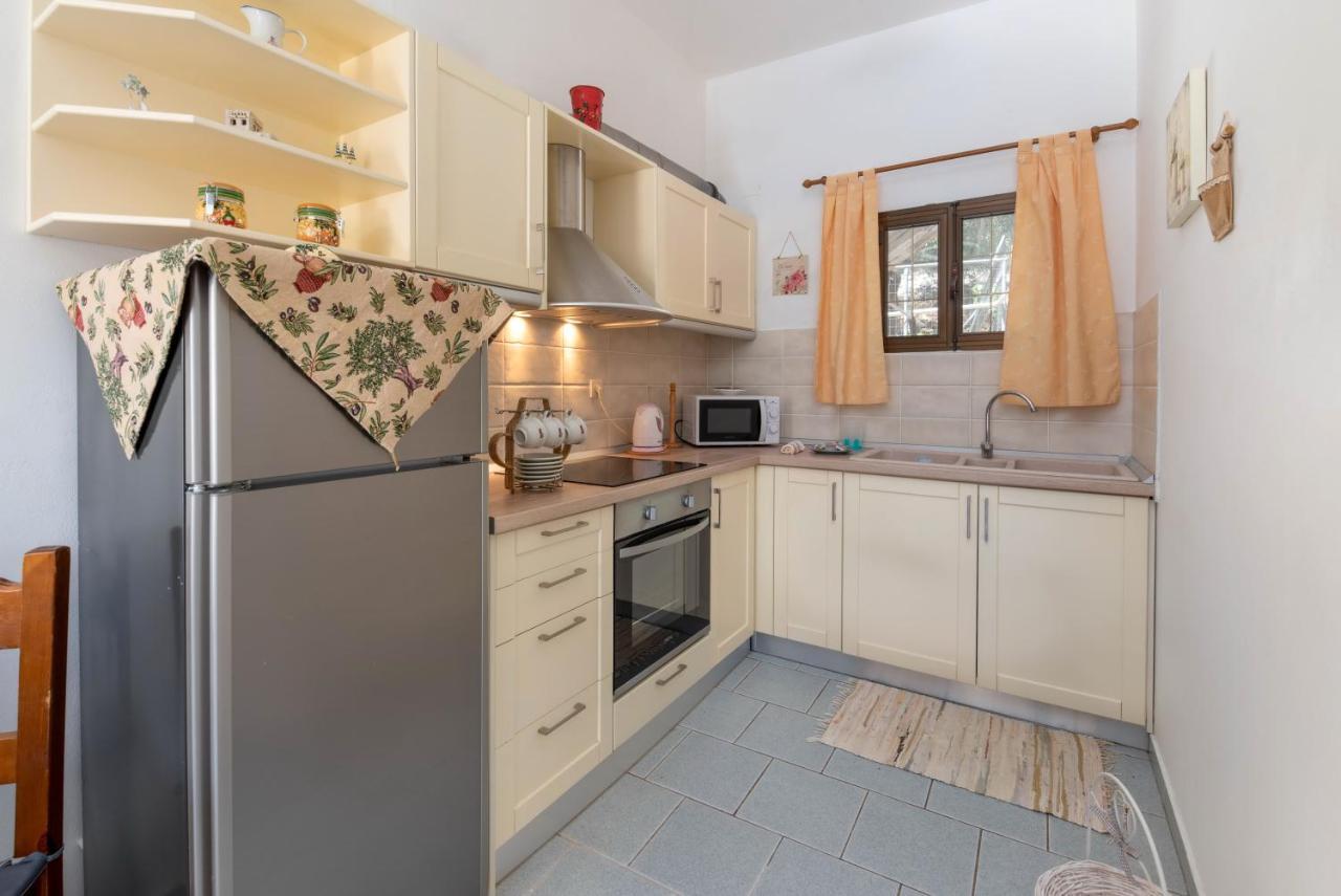 Voula Apartments Gaios Bagian luar foto